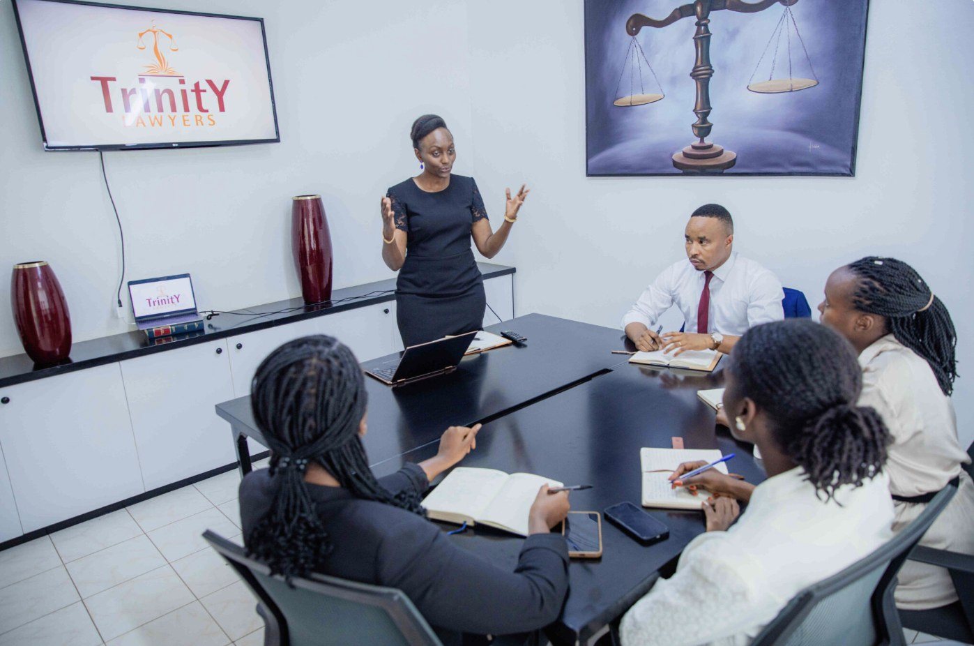 A Trinity Lawyers team meeting in the boardroom