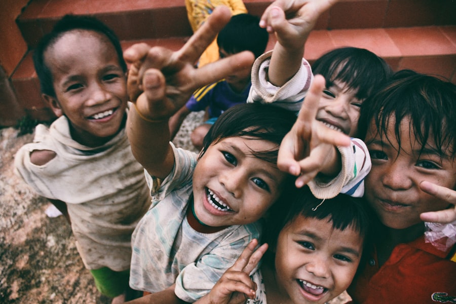 Children waving at the camera